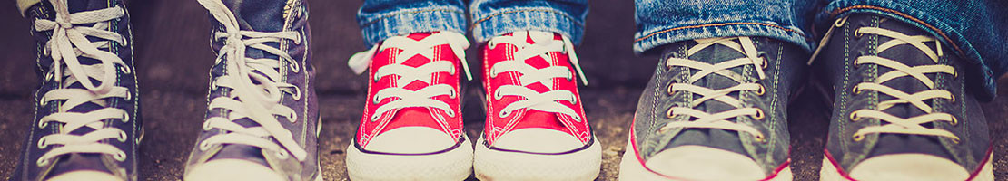 large and small shoes lined up